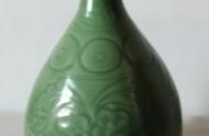 南宋龙泉梅子青釉玉壶春瓶：历史与艺术的完美结合